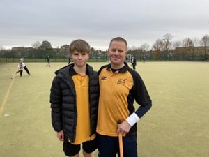  Cystic fibrosis patient Tim Wotton and his son, Felix, playing hockey together. Photo by Tim Wotton. 