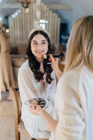 Cróna having her wedding make-up done