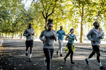 Woman with asthma running race with other athletes confident her asthma is under control