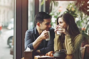 couple-drinking-coffee-in-a-coffee-shop